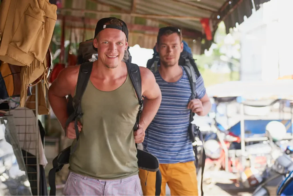 two backpackers looking how to get to lombok from bali
